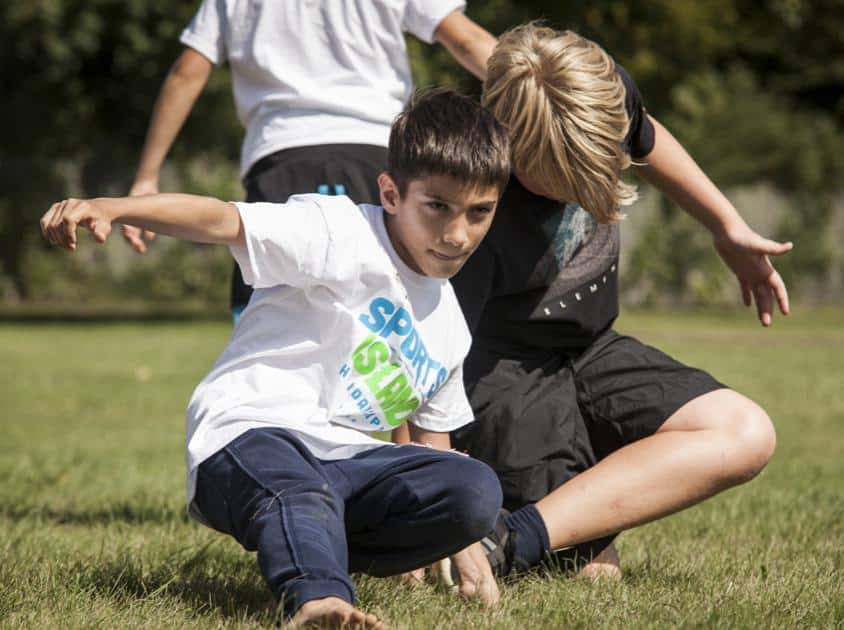 Coole Sportarten: Funsport & Trendsport Kinder dancen gemeinsam und üben Moves